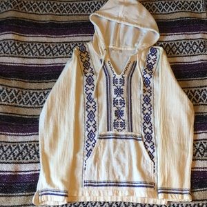 White and blue pull over